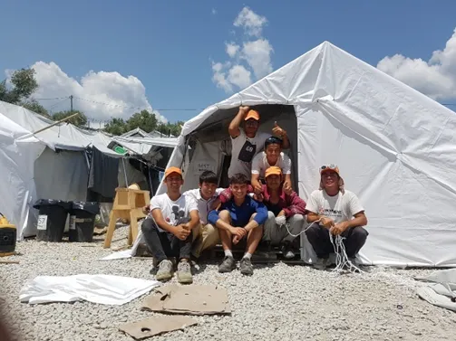 The tent building team in Zone 6